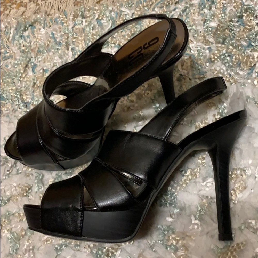 Black open toe strappy heels.